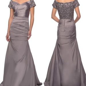 Brand new, has tags. Great for mother of bride or groom.